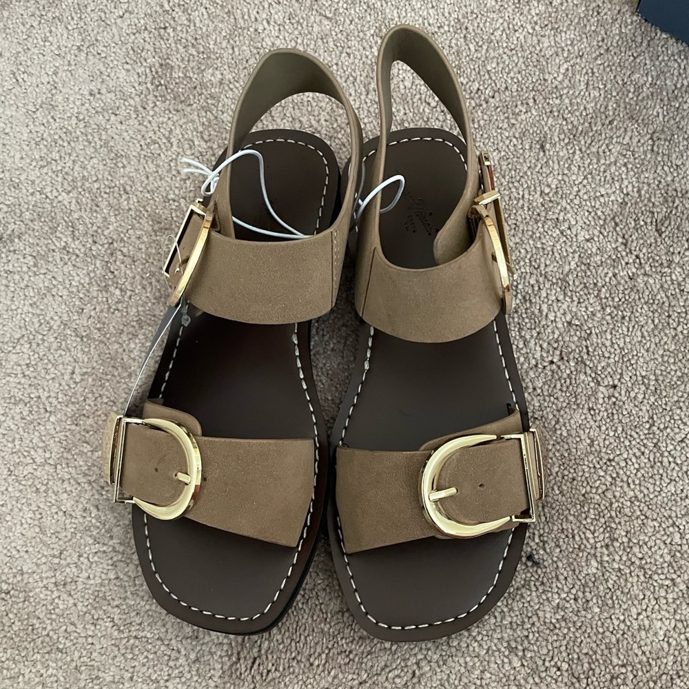 Brown with gold accent brand new never worn shoes.